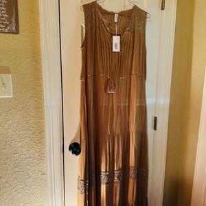Sleeveless boutique dress. New with tags.